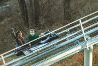 guests riding the Wild Stallion mountain coaster at SkyLand Ranch
