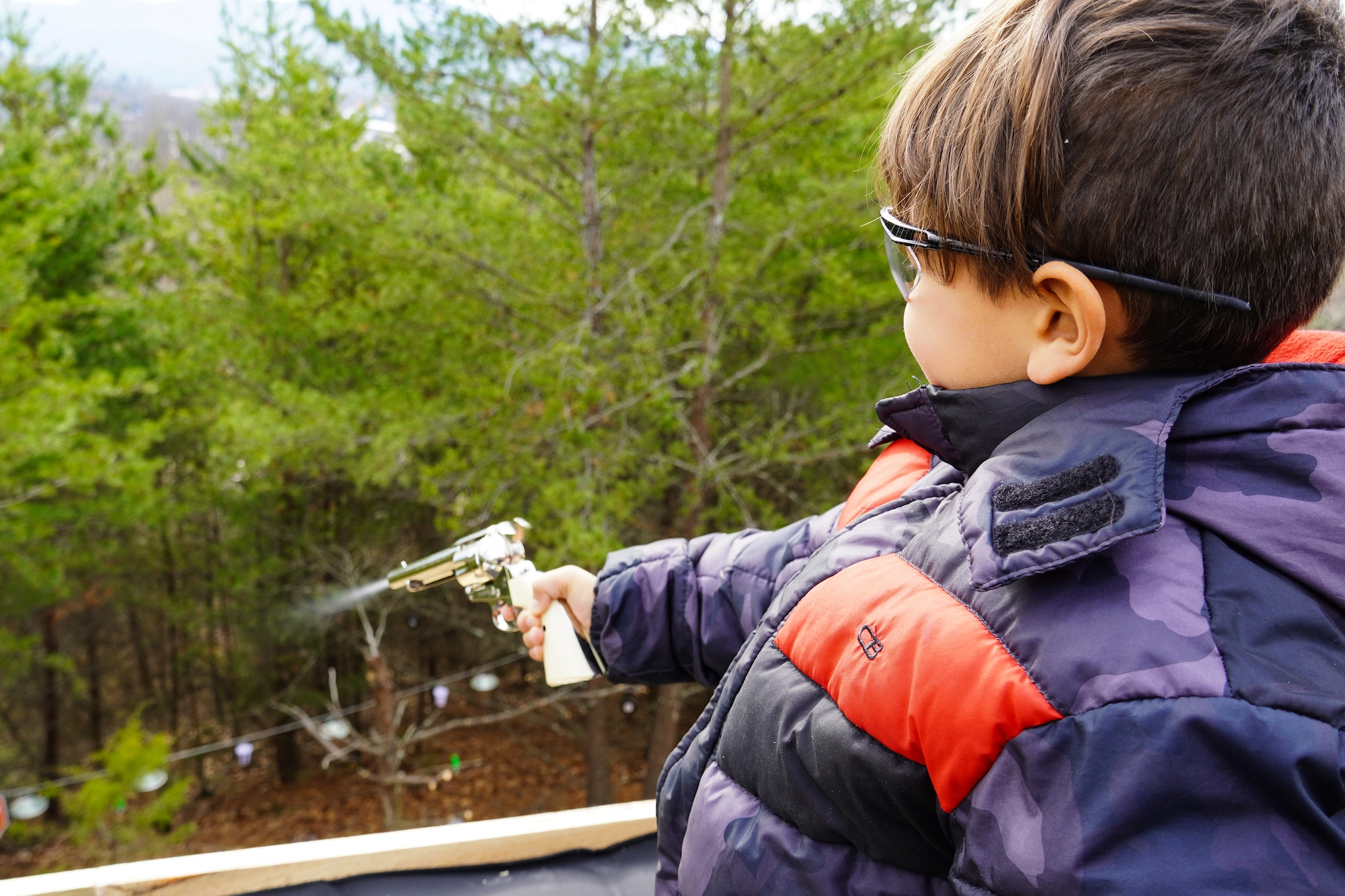 kid with BB gun at SkyLand Shootout