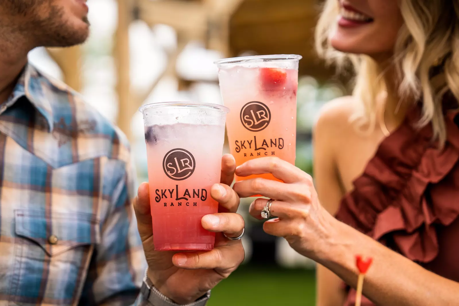 couple toasting with spring drinks