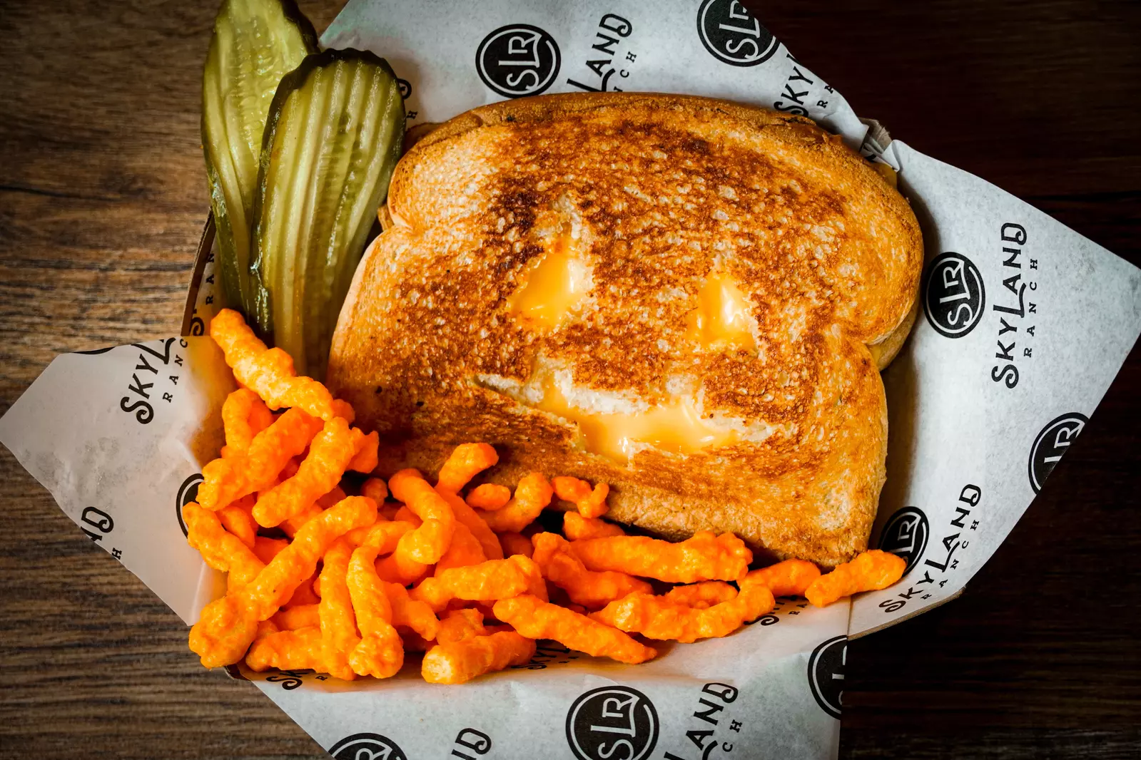 Grilled Cheese with jack o lantern carvings and cheetos
