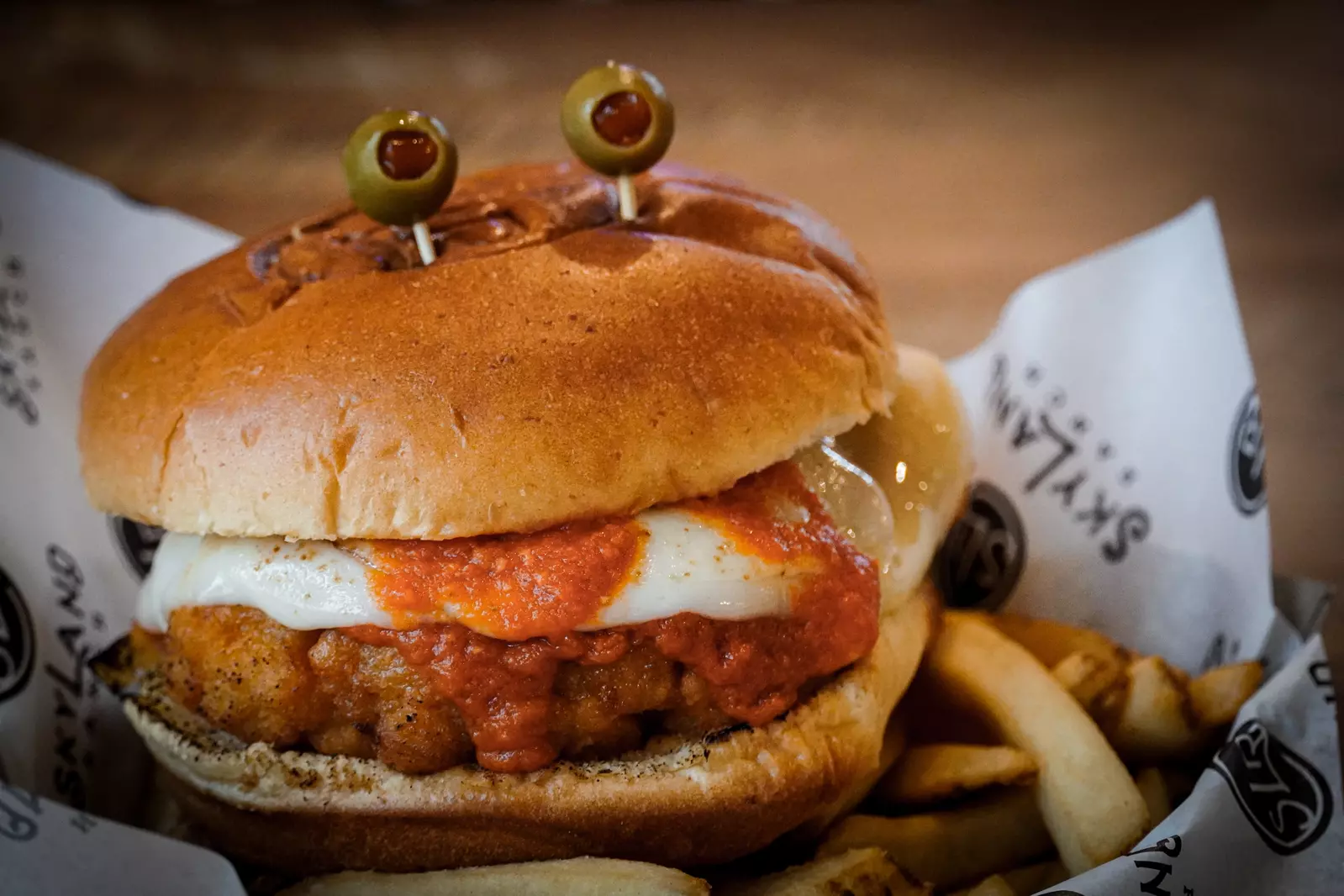 burger with olives for eyes
